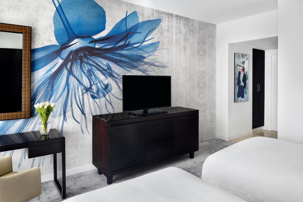 Moevenpick Hotel Jumeirah Lakes Towers Dubai Exterior photo A guest room at the hotel