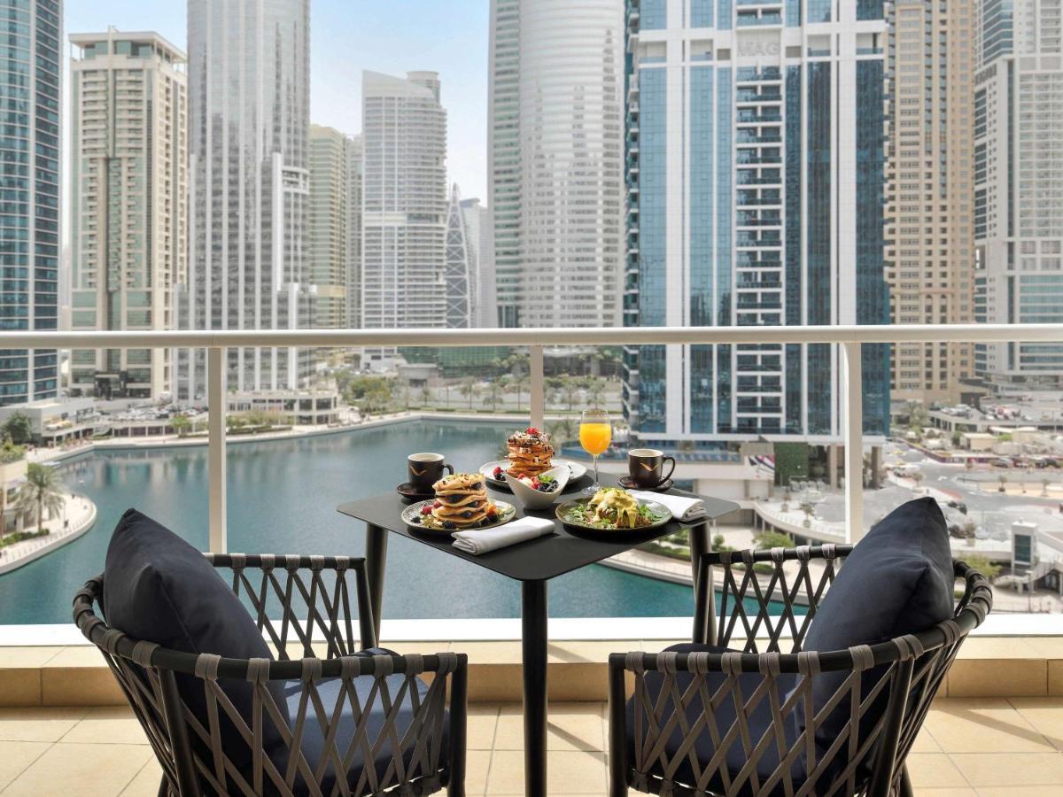 Moevenpick Hotel Jumeirah Lakes Towers Dubai Exterior photo View from the balcony of a suite